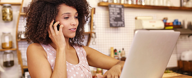 5-17 Woman Ordering Custom Sign for Her Local Business