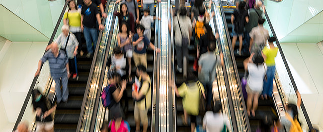 Crowd Of People On Escalators - S4-5