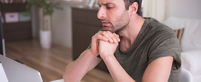 Man Contemplating the Decision of Which Sign to Choose for His Business 4-22 (1)