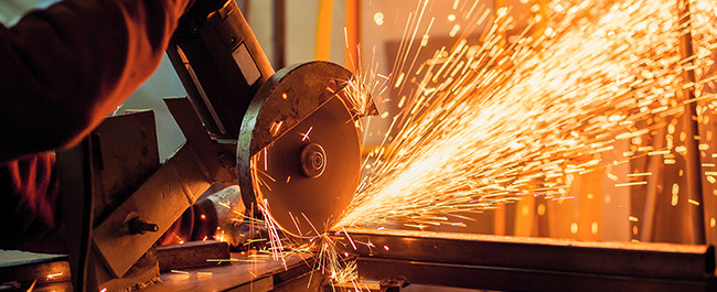 Person Working On Business Sign In Factory - 3-17