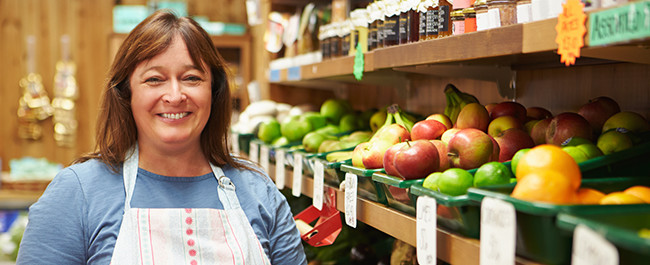 Woman Happy Because She Updated Her Sign Cheaply