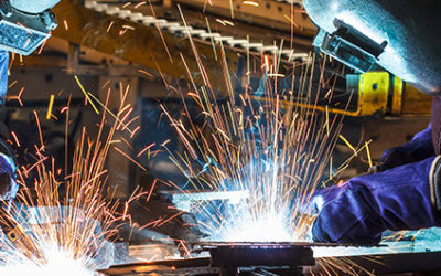 Signtronix Employee Welding An Outdoor Sign