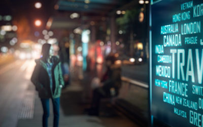 Digital Sign at a bus stop showing different travel destinations